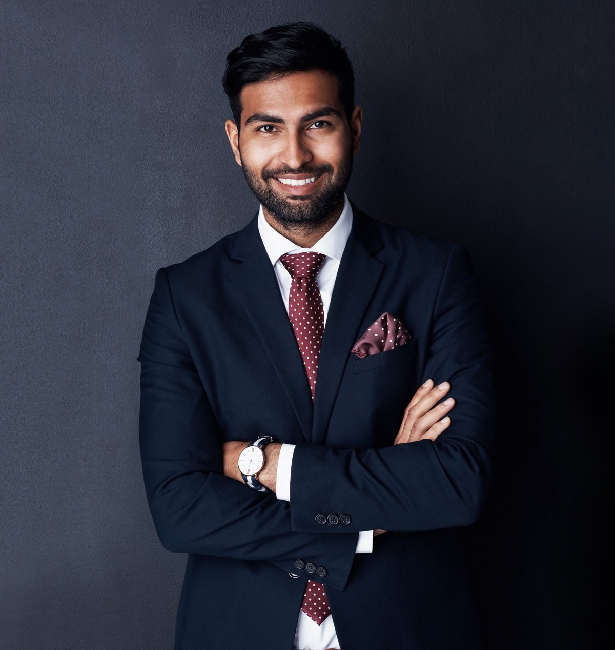 Studio shot of a confident young businessman posing